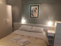 Posteľ alebo postele v izbe v ubytovaní Deluxe Apartment Best Point