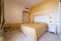 Posteľ alebo postele v izbe v ubytovaní Hotel Diplomat Palace