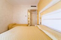 Posteľ alebo postele v izbe v ubytovaní Hotel Diplomat Palace