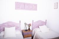Cama o camas de una habitación en Apartamentos Vista Veleta