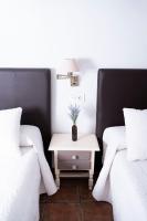 Cama o camas de una habitación en Apartamentos Vista Veleta