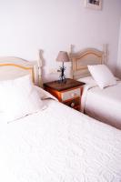 Cama o camas de una habitación en Apartamentos Vista Veleta
