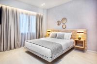 Posteľ alebo postele v izbe v ubytovaní Pefki Deluxe Residences