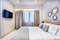 Posteľ alebo postele v izbe v ubytovaní Pefki Deluxe Residences