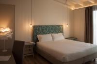 Posteľ alebo postele v izbe v ubytovaní Hotel Berta