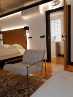 Postel nebo postele na pokoji v ubytování Andromeda Downtown Residence
