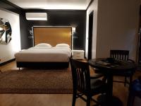 Postel nebo postele na pokoji v ubytování Andromeda Downtown Residence