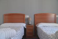 Postel nebo postele na pokoji v ubytování Caxila Apartamentos Rurales - Luarca