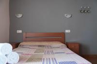 Postel nebo postele na pokoji v ubytování Caxila Apartamentos Rurales - Luarca