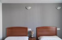 Postel nebo postele na pokoji v ubytování Caxila Apartamentos Rurales - Luarca