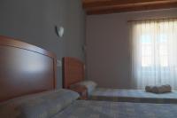 Postel nebo postele na pokoji v ubytování Caxila Apartamentos Rurales - Luarca