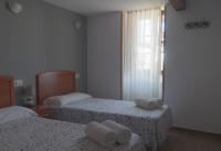 Postel nebo postele na pokoji v ubytování Caxila Apartamentos Rurales - Luarca