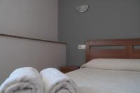 Postel nebo postele na pokoji v ubytování Caxila Apartamentos Rurales - Luarca