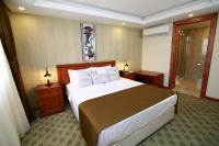 Postel nebo postele na pokoji v ubytování Tuzla Garden Hotel & Spa