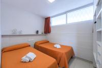 Posteľ alebo postele v izbe v ubytovaní Rentalmar Navarra family suites