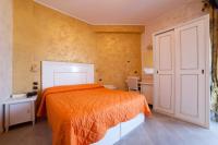 Posteľ alebo postele v izbe v ubytovaní Hotel Diplomat Palace