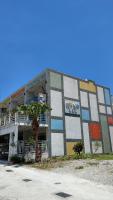a building with a mural on the side of it at Sweet Rainbow B&amp;B in Hualien City
