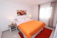 Posteľ alebo postele v izbe v ubytovaní Apartment Sorriso 2
