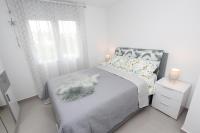 Posteľ alebo postele v izbe v ubytovaní Apartment Sorriso 2