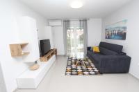 Televízia a/alebo spoločenská miestnosť v ubytovaní Apartment Sorriso 2