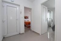 Posteľ alebo postele v izbe v ubytovaní Apartment Sorriso 2