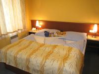 Posteľ alebo postele v izbe v ubytovaní Aparthotel Austria Suites