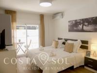 Posteľ alebo postele v izbe v ubytovaní LA CARIHUELA TORREMOLINOS - STUDIO 2- COSTA SOL HOLIDAY RENTALS