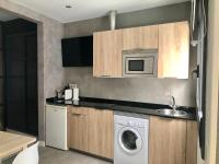 Kuchyň nebo kuchyňský kout v ubytování Apartamentos Las Vegas