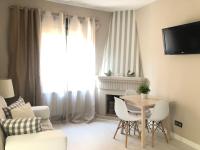 TV a/nebo společenská místnost v ubytování Apartamentos Las Vegas