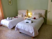 A bed or beds in a room at Avgi Garden House Chania with private entrance