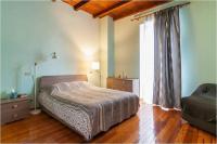 Posteľ alebo postele v izbe v ubytovaní Villa Magnolia Lago Maggiore