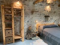 A bed or beds in a room at Magic Mill Castagnetoli