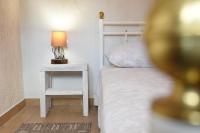 Posteľ alebo postele v izbe v ubytovaní House & Apartment Palača