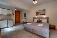 Postel nebo postele na pokoji v ubytování Angelica Hotel