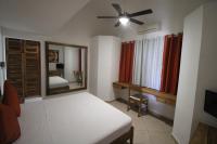 Postel nebo postele na pokoji v ubytování Albachiara Hotel - Las Terrenas
