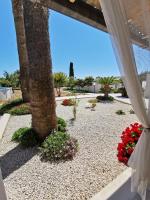 A garden outside VILLA GIUMMARITO B&B