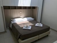 Posteľ alebo postele v izbe v ubytovaní Time Out ApartHotel