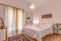 Posteľ alebo postele v izbe v ubytovaní Marveco Apartment