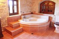 A bathroom at The Vivian - Luxury Stone Villa