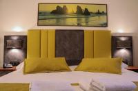 Postel nebo postele na pokoji v ubytování Hotel Dionysis Studios