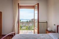 Postel nebo postele na pokoji v ubytování Appartamento Luisa - Vista Lago