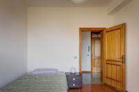Postel nebo postele na pokoji v ubytování Appartamento Luisa - Vista Lago