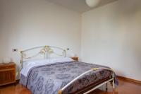 Postel nebo postele na pokoji v ubytování Appartamento Luisa - Vista Lago