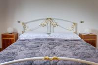 Postel nebo postele na pokoji v ubytování Appartamento Luisa - Vista Lago