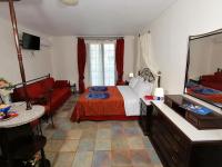 Postel nebo postele na pokoji v ubytování Vasilaras Hotel