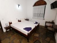Postel nebo postele na pokoji v ubytování Vasilaras Hotel