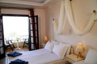 Postel nebo postele na pokoji v ubytování Vasilaras Hotel