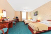 Posteľ alebo postele v izbe v ubytovaní Hotel Arkadia