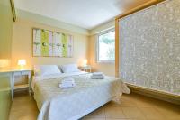 Posteľ alebo postele v izbe v ubytovaní Beachside Bungalows