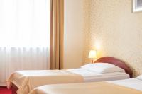 Posteľ alebo postele v izbe v ubytovaní Hotel Arkadia